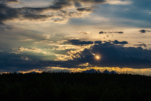 Sun bursting through Clouds